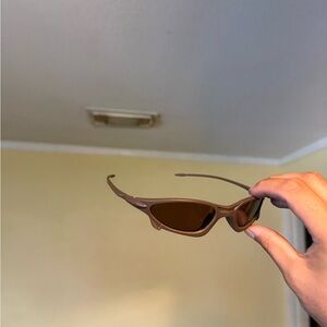 Sleek Brown Sporty Sunglasses Oakley Oakleys